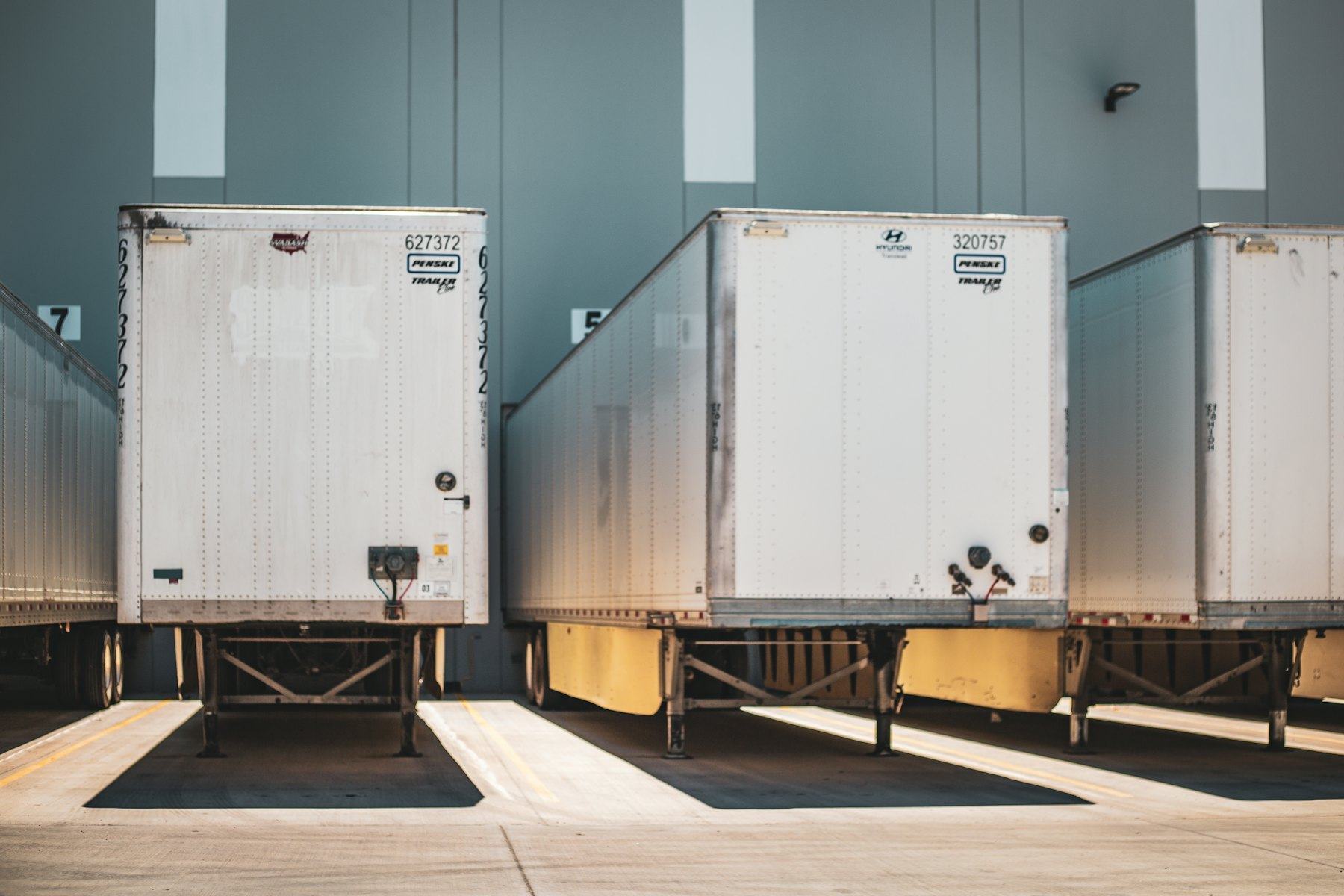 53-foot dry van trailers backed into dock doors